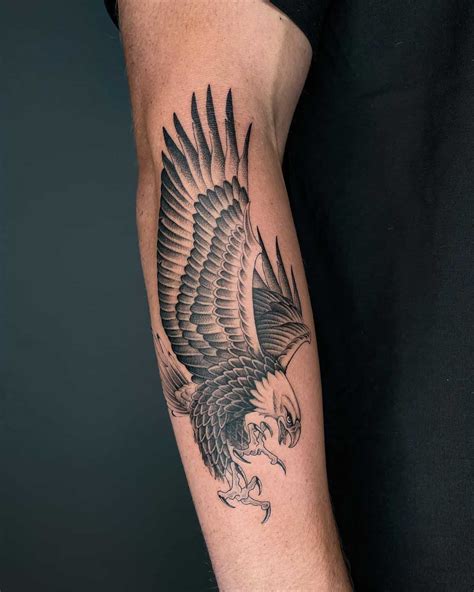 eagle tattoo on wrist|eagle tattoo on forearm.